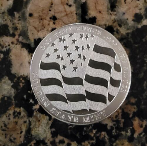 Home Of The Free Because... 1 oz .999 Silver BU Round with Protective Capsule.