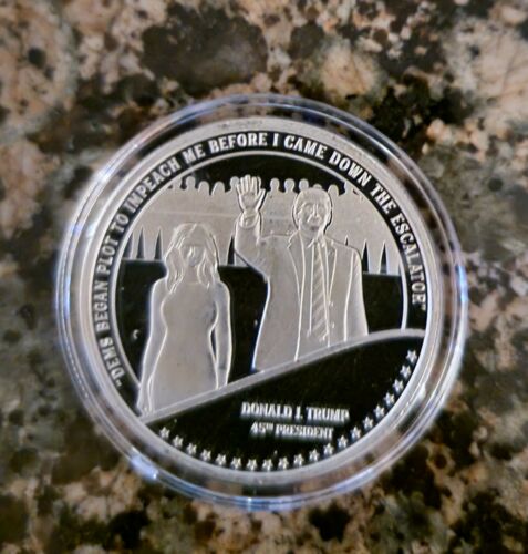 DONALD TRUMP and MELANIA ESCALATOR 1 TROY OZ .999 FINE SILVER ROUND